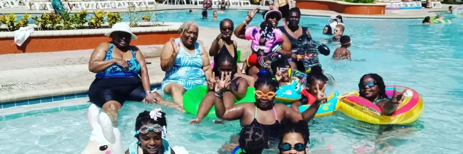 Group of friends enjoying the pool at Parkway Orlando resort