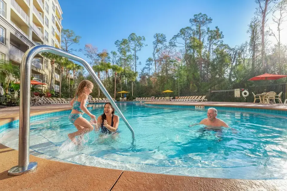 Resort pool area with palm trees