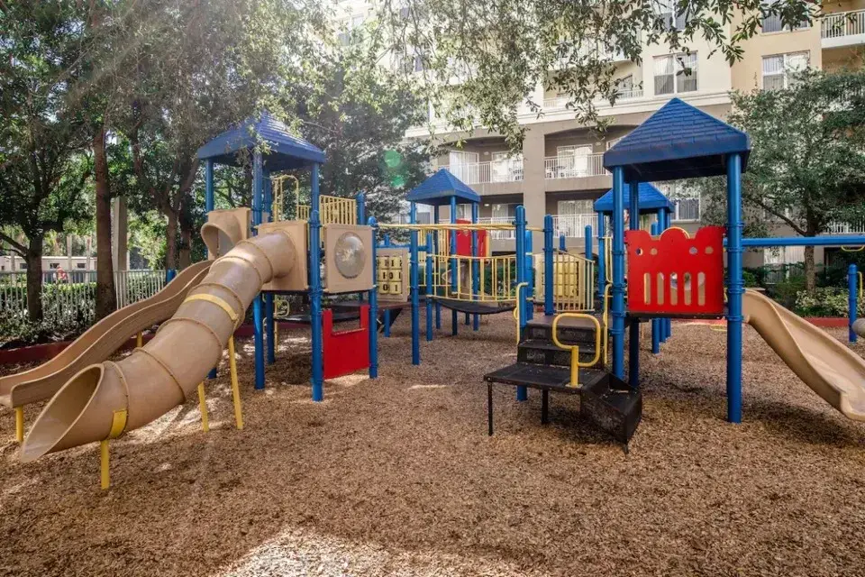 Colorful playground with slides and climbing structures