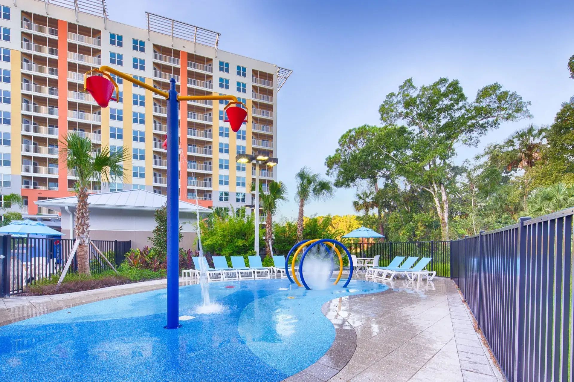 Splash pad with water-play features for children