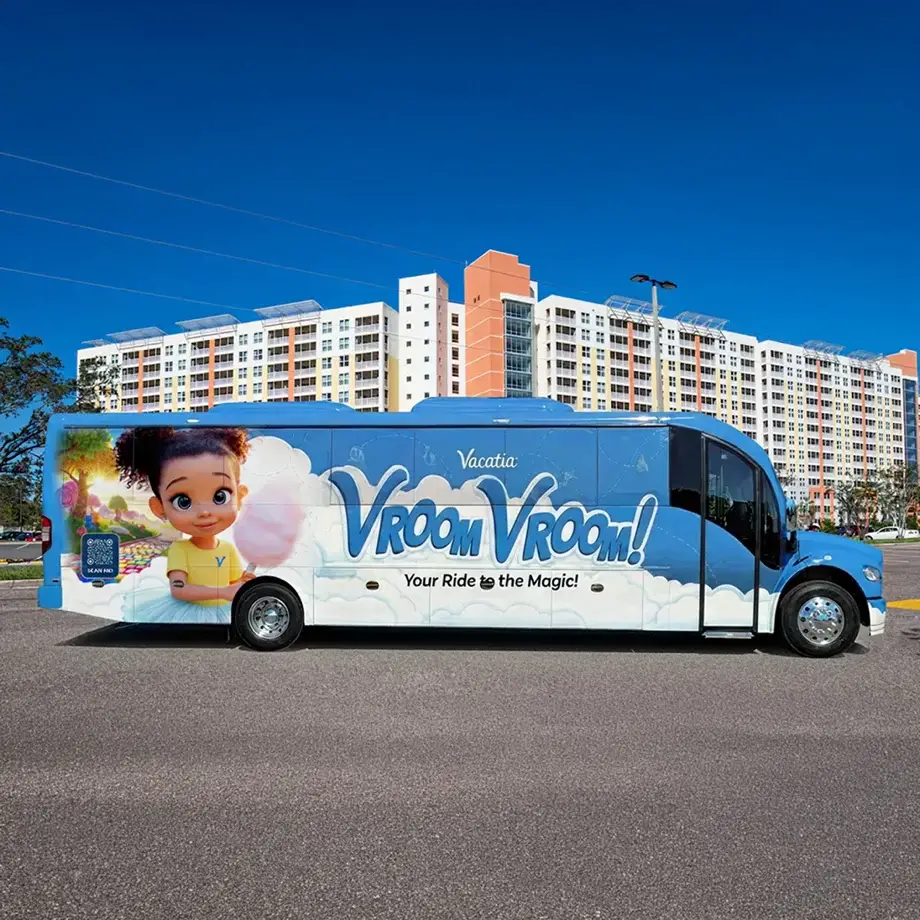 Vroom Vroom shuttle bus with resort branding parked at Vacation Village at Parkway