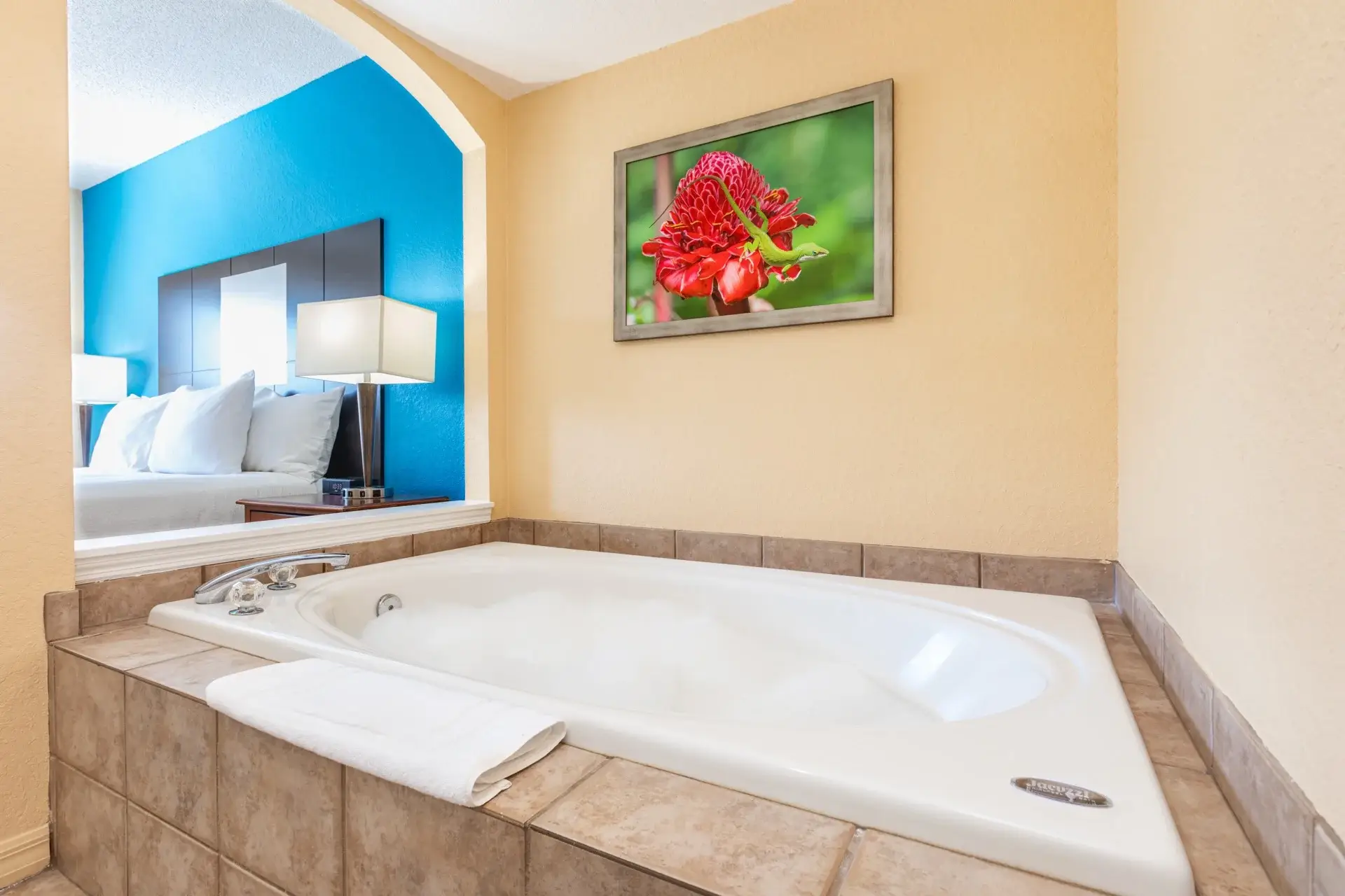 A Suite primary bedroom with jetted tub (or oversized tub)