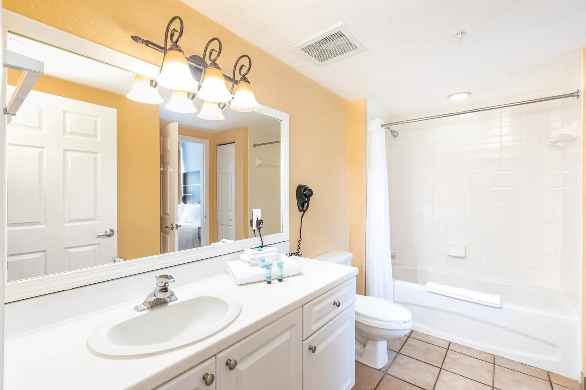 B Suite bathroom with tub and shower