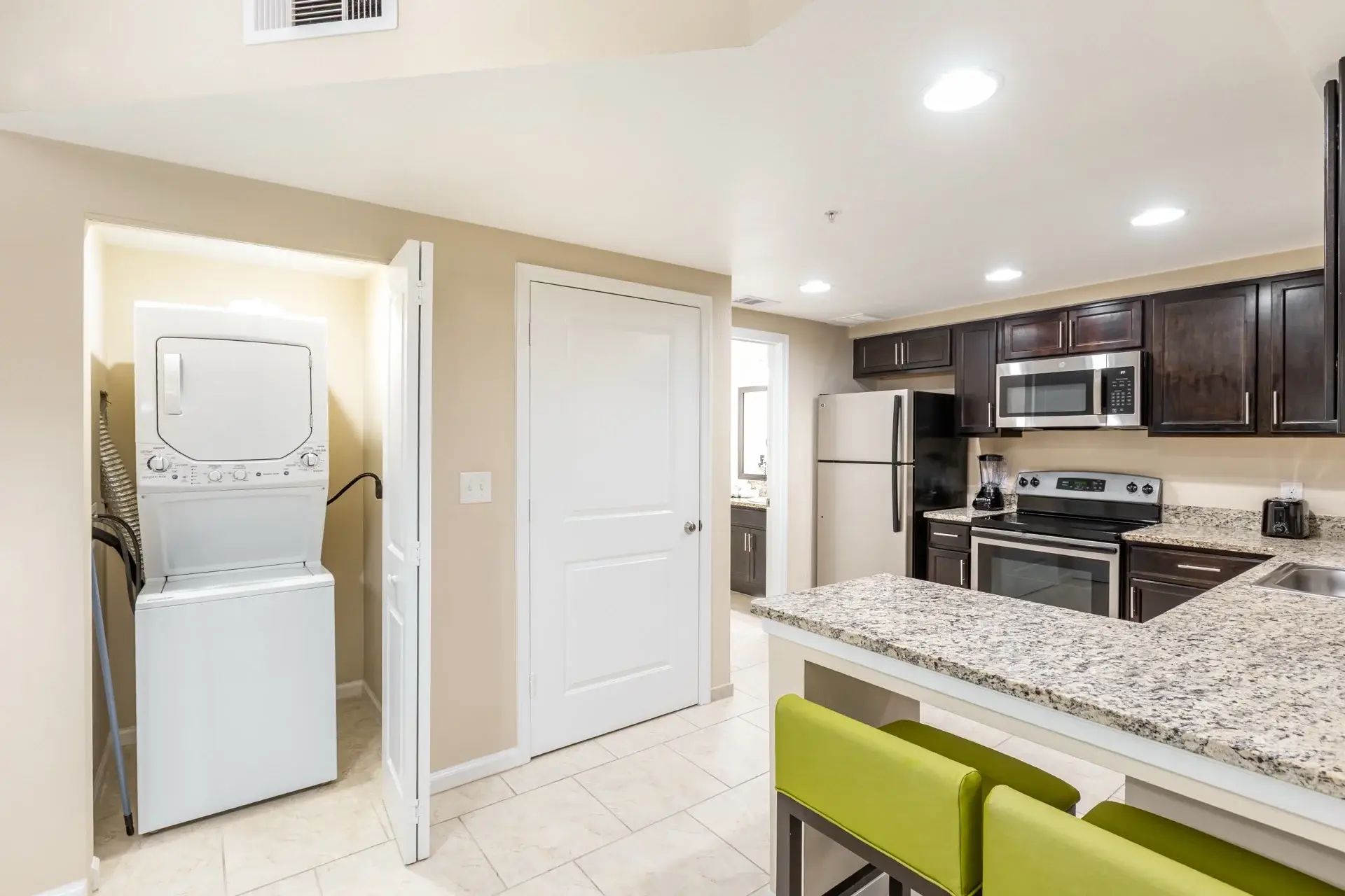 A Suite kitchen and in-suite washer and dryer
