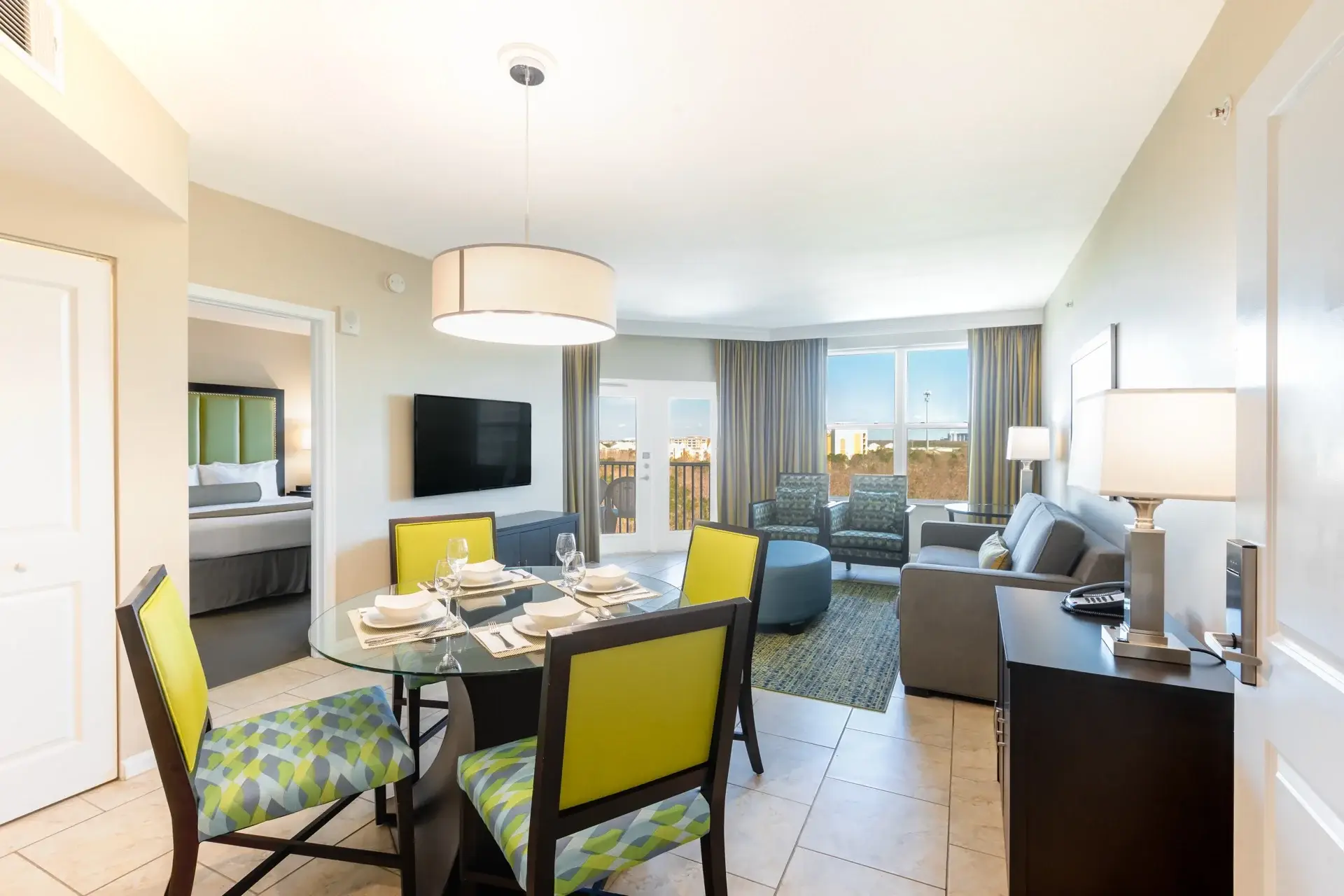 C Suite with dining and living room