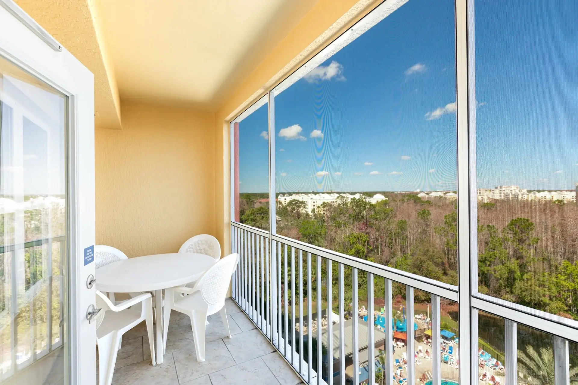 C Suite with furnished screened-in balcony